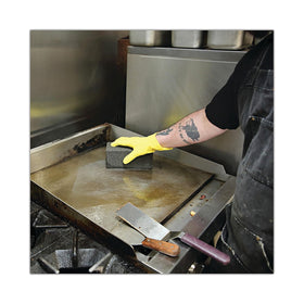 3M Grill-Brick carbonized-grease removal efficiently lifts burnt oil from flat-top surfaces.