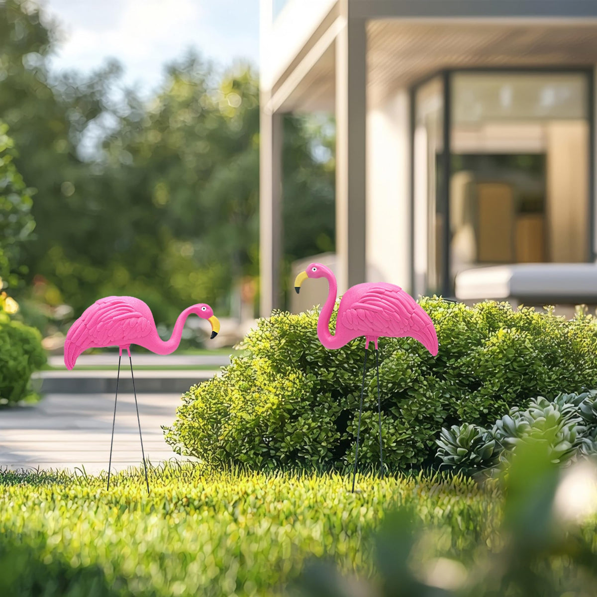 4E's Novelty pink flamingos with 21-inch metal legs provide stable lawn statues