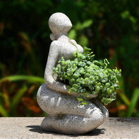 ACLEMA head-face planter closeup showing durable resin design.