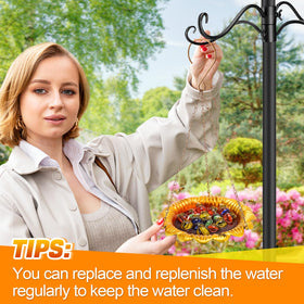 Acostop hanging watering station doubles as garden decor and pollinator resource.