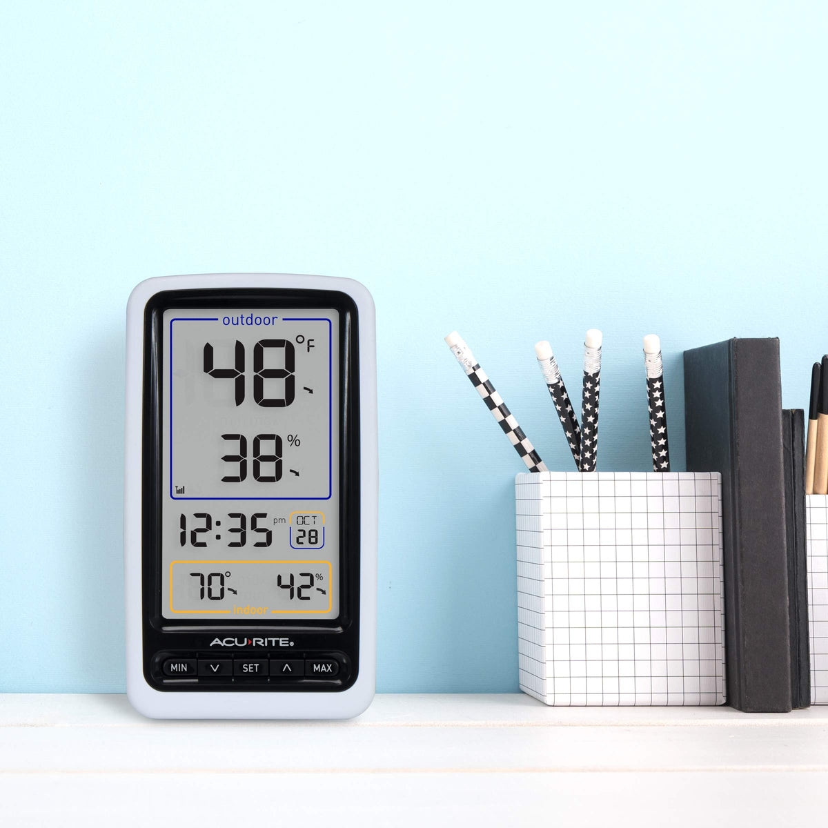 AcuRite 01136M outdoor sensor transmits data wirelessly up to 165 feet.