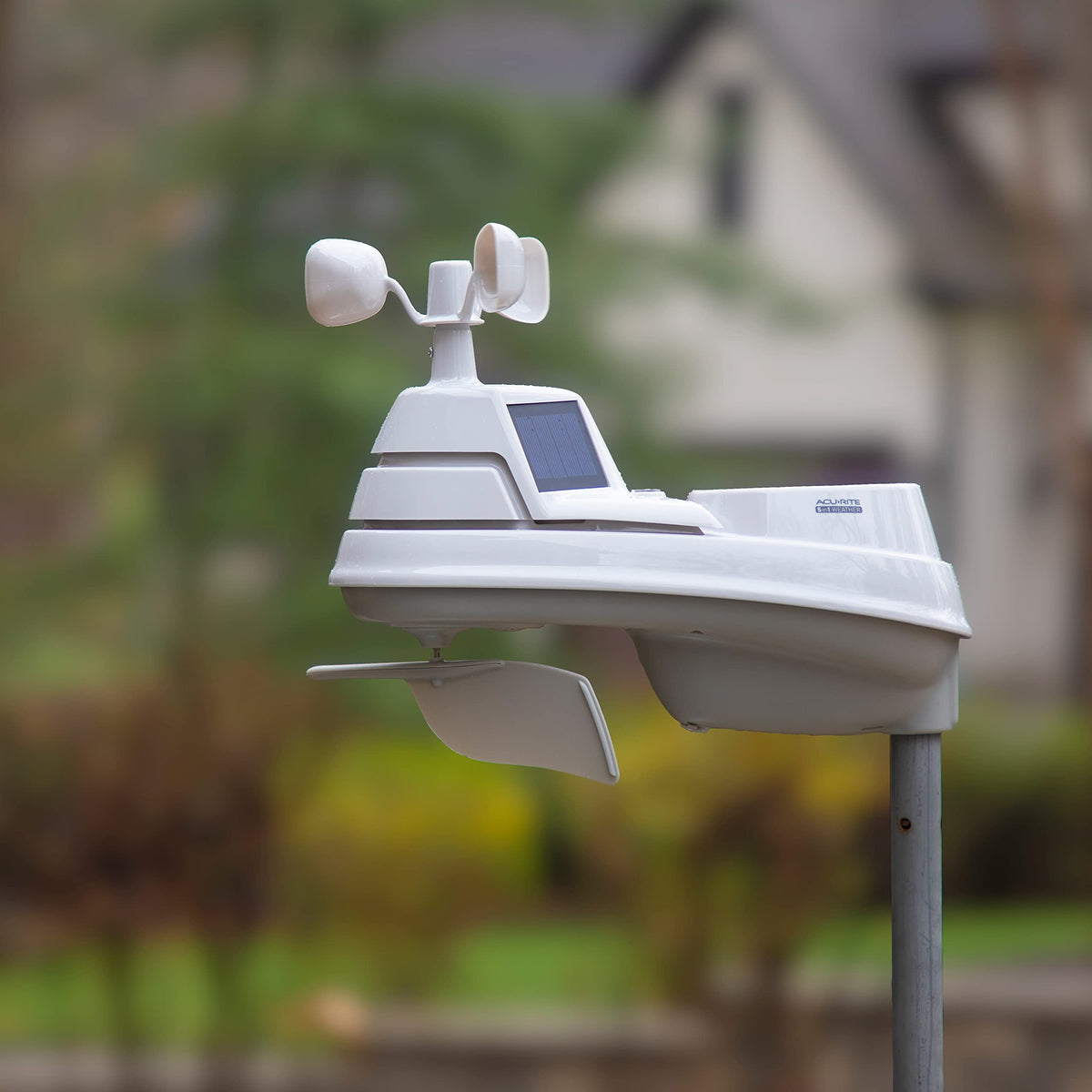 AcuRite Iris PRO+ outdoor installation showing secure wind direction and speed sensors.