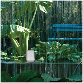 Acurite digital history display highlighting daily rainfall trends.