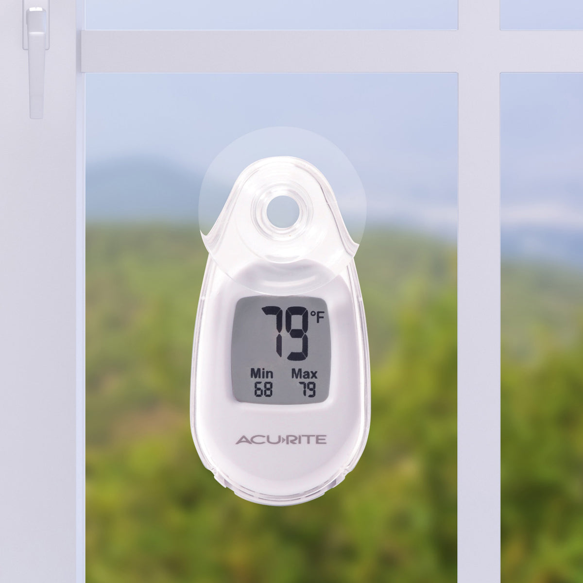 AcuRite suction cup window thermometer mounted on a window with easy installation.