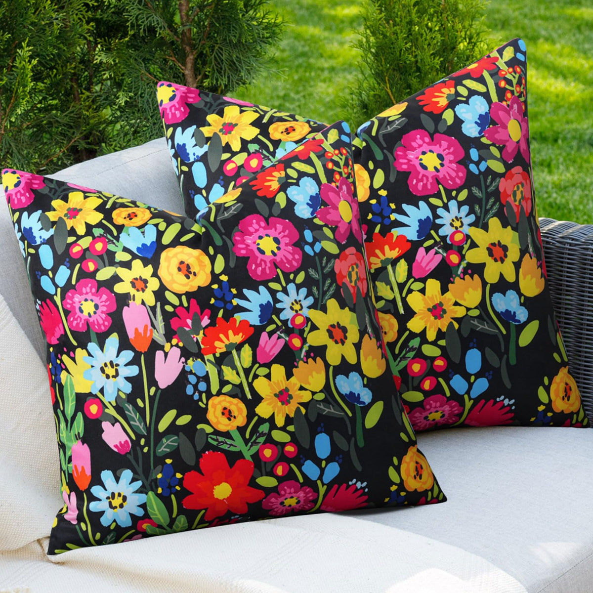 Adabana floral pillow cover in black for outdoor styling and waterproof use.
