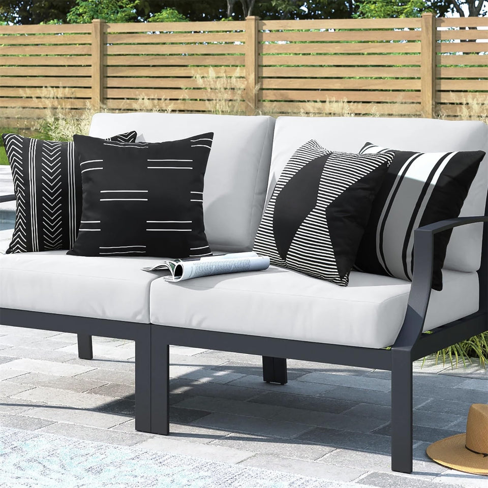 Adabana outdoor pillow cover in black and white geometric pattern protects cushions from water