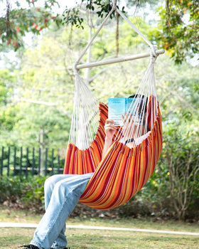 ADVOKAIR hammock chair mounted on a tree branch for easy backyard relaxation