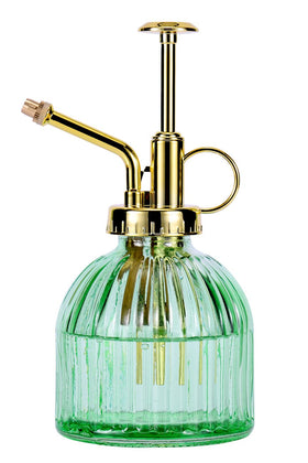 Aebor Glass Plant Mister bottle in green with a gold top for indoor plant care.