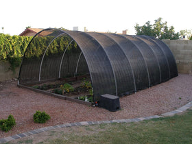 Agfabric black shade cloth provides discreet heat reduction and privacy.
