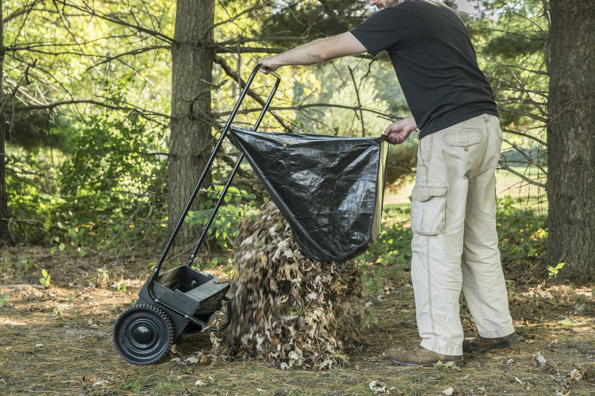 Agri-Fab 7-cu-ft hopper bag detaches for easy dumping.