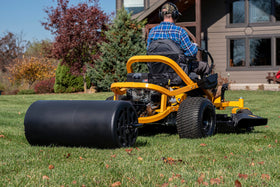 Tow-behind setup compatible with lawn tractors.