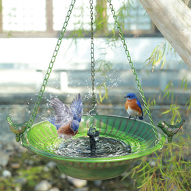 AIHAOKAN bird bath with hanging chains and S-hook shown in a sunny patio.