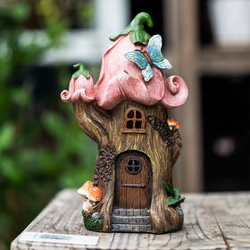 AIINY pink resin gnome with mushroom details for outdoor display.