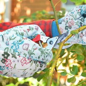 Ainiv packaging highlights gift-ready floral gloves set.