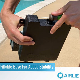 Airlie adjustable feet accommodate sloped pool edges for a stable placement.