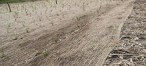 AK Trading Co landscaping erosion protection blanket on sloped ground