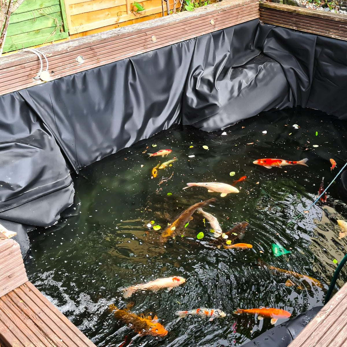 ALDMIO waterfall pond liner installed for a backyard water feature