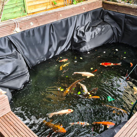 ALDMIO waterfall pond liner installed for a backyard water feature