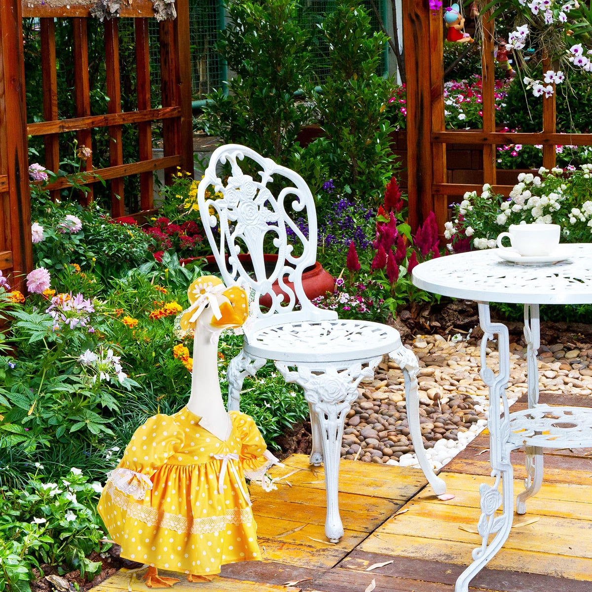 Aliceset 23-inch goose statue wearing the outfit on a sunny porch