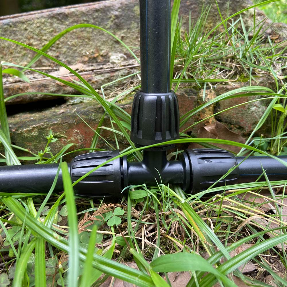 ALKARAMA quick-connect fittings simplify irrigation across raised beds.
