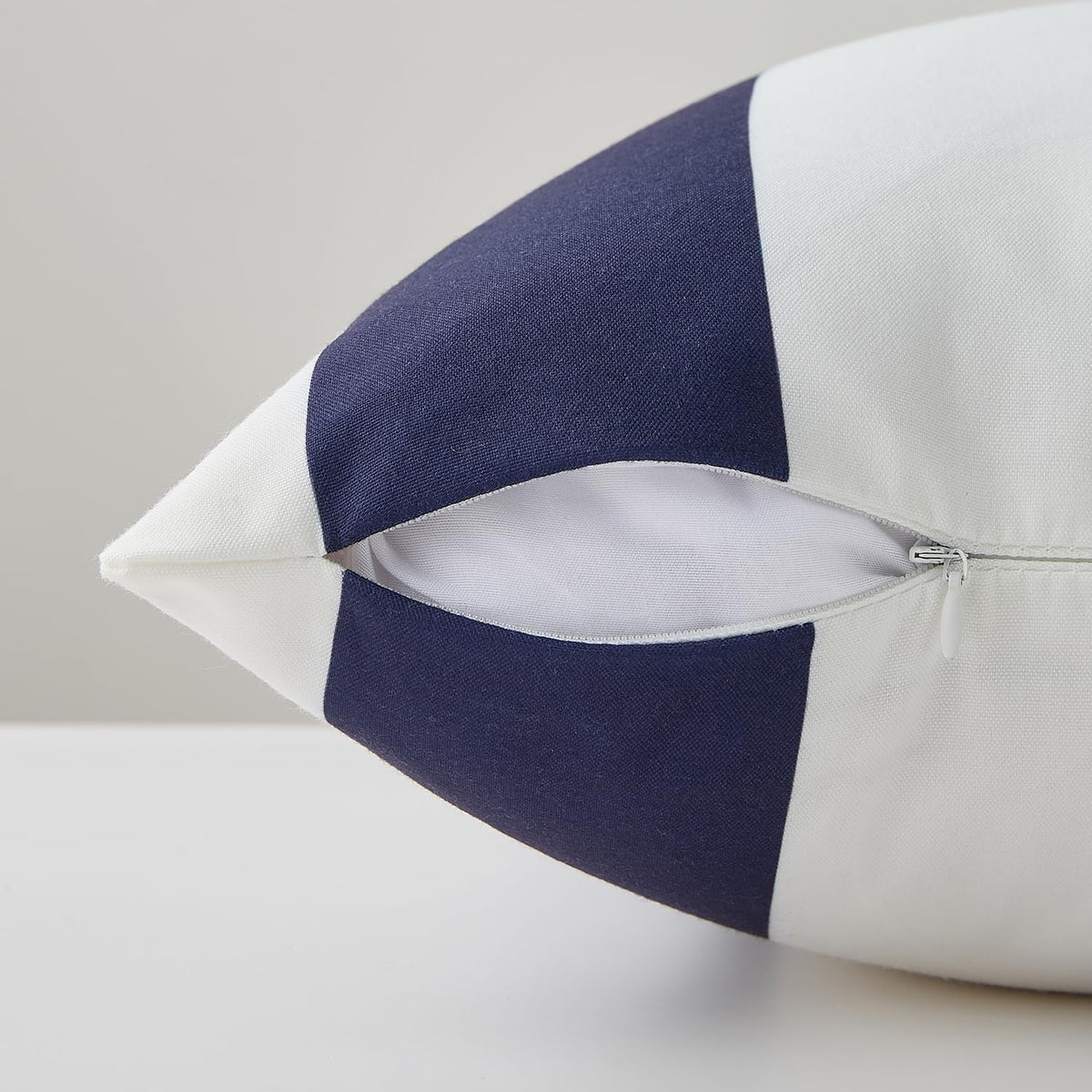 Allorry navy striped fabric close-up showing durable, fade-resistant material.