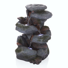 Alpine Corporation 22-inch 3-tier fountain on patio showing natural stone look and tranquil ambiance