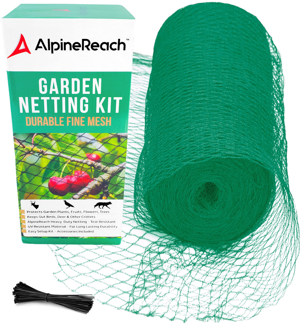 AlpineReach garden netting unrolled over beds for bird and critter protection.