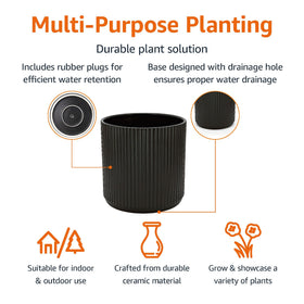 Amazon Basics black fluted planter with visible drainage hole for healthy roots.