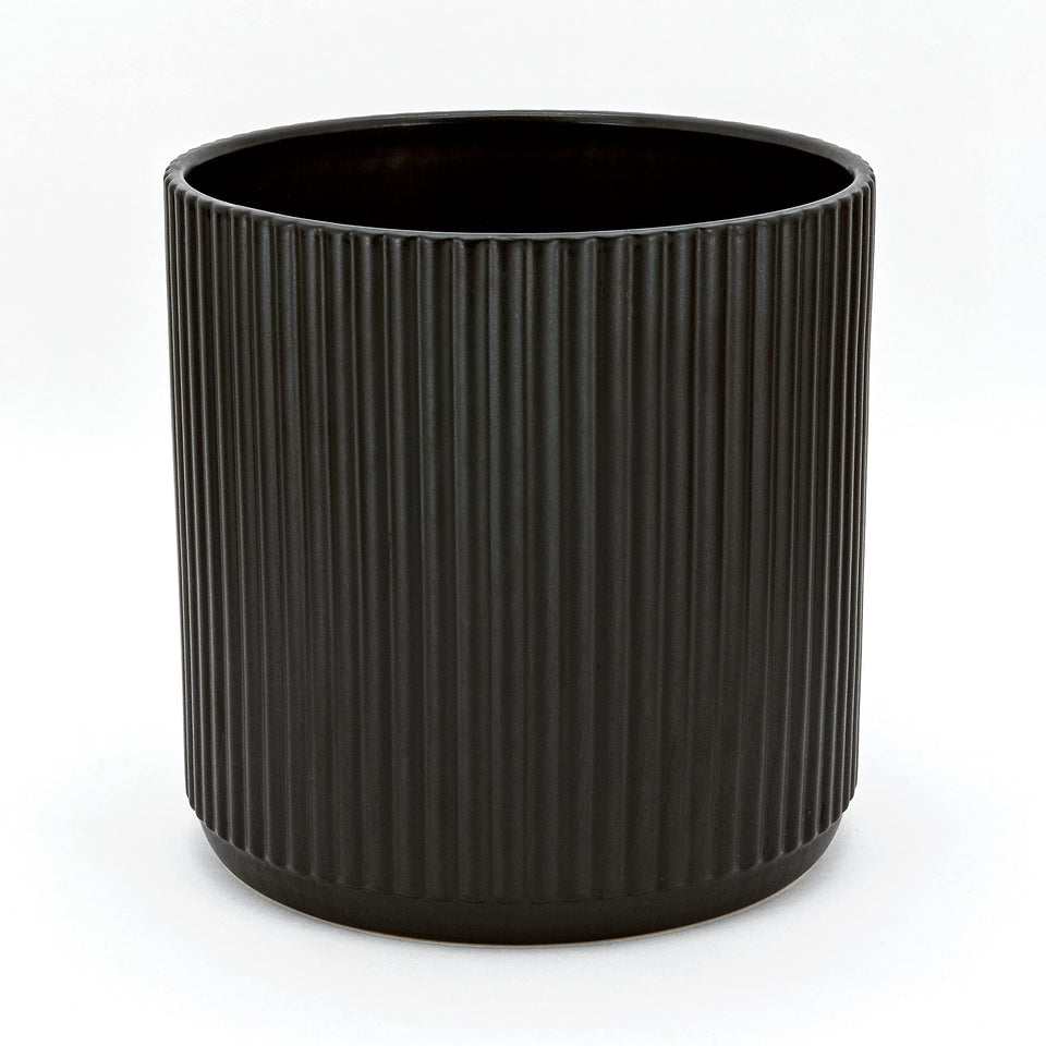 Amazon Basics fluted ceramic round planter showing elegant surface texture.