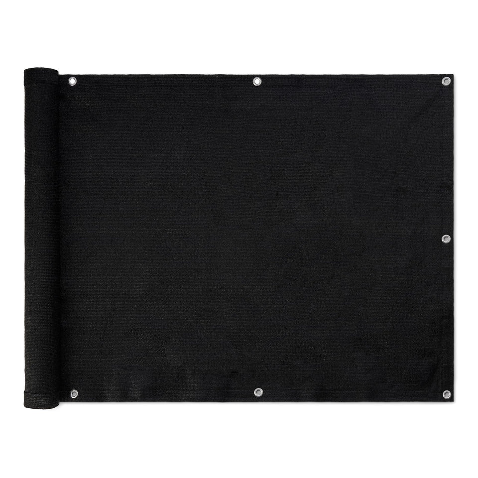 Amazon Basics privacy screen fence for outdoor patio blocks sight while allowing air flow.
