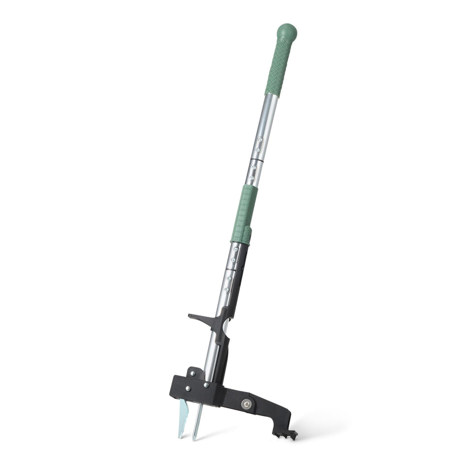 Amazon Basics weed puller with 4-claw head for easy root extraction in gardens.