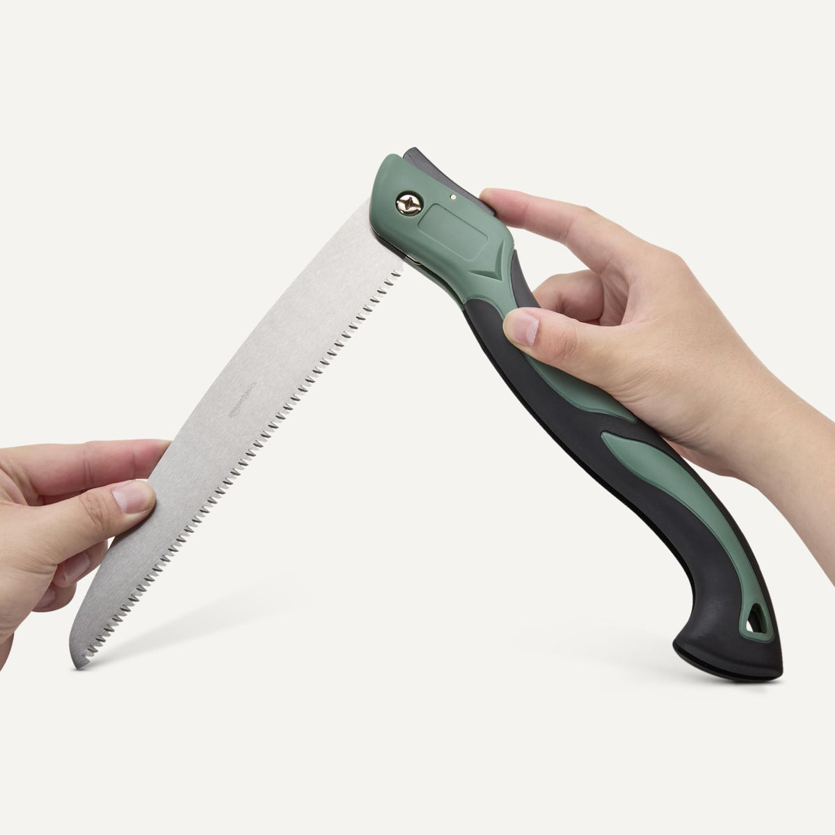 Amazon Basics pruning saw blade extended for efficient push-pull cutting.