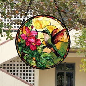 AMDERVEN artistic hummingbird suncatcher features intricate, decorative patterns.