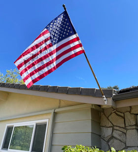 Amervex flag sleeve enhances holiday curb appeal for homes.