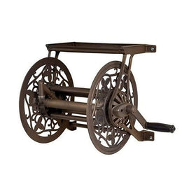 AMES NeverLeak decorative wall mount hose reel in brown with floral accents for outdoor organization.
