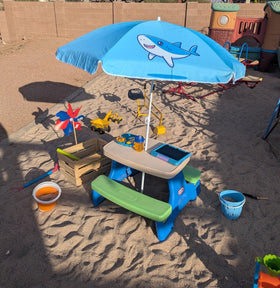 Umbrella setup suitable for beach-side shade and outdoor tables