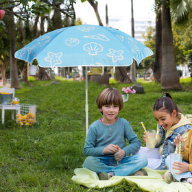 AMMSUN Beach shade protecting kids during beachside playtime.