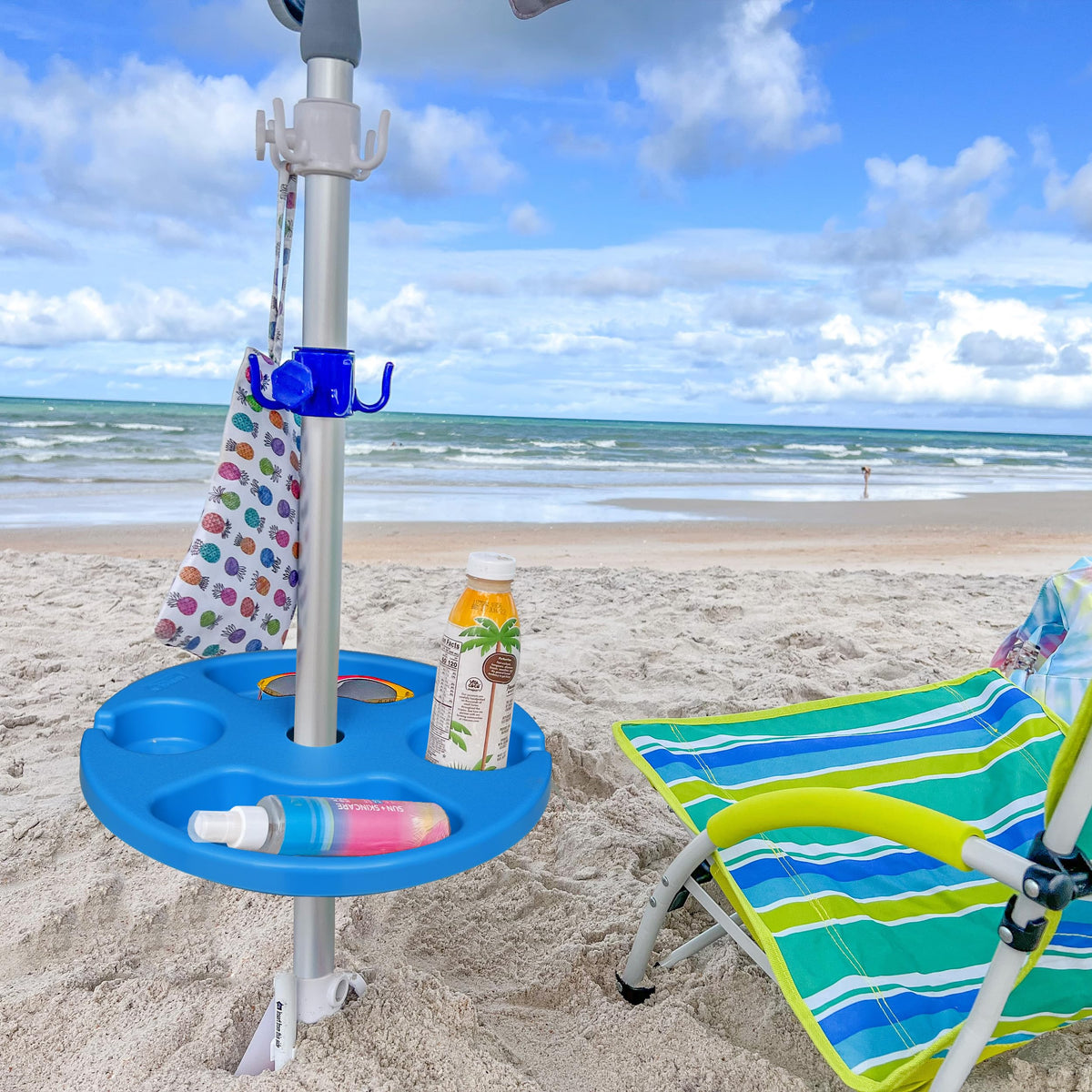 AMMSUN beach umbrella table featuring cup holders and snack trays keeps essentials organized by the pool
