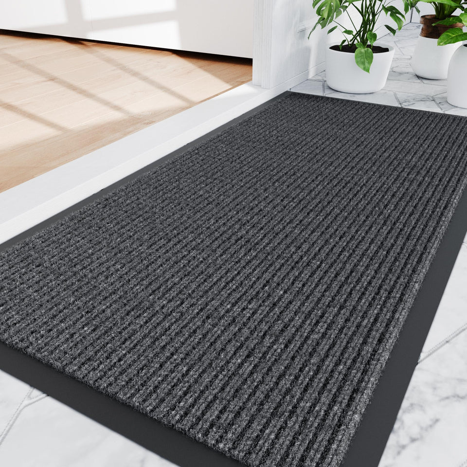 Amyracel front door mat dirt-capture with deep grooves traps dirt effectively.