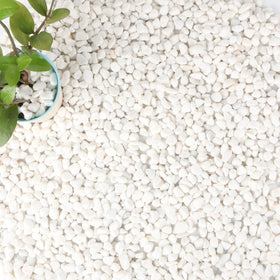 Anothera white pebbles bulk bag showing natural stones for durable garden accents