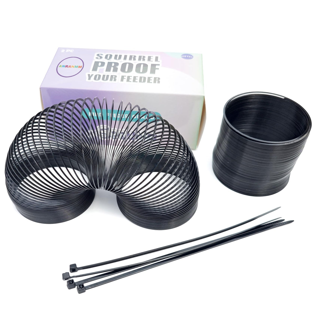 Anranmm Squirrel Proof Spring Device on a pole protects your bird feeder from intruders