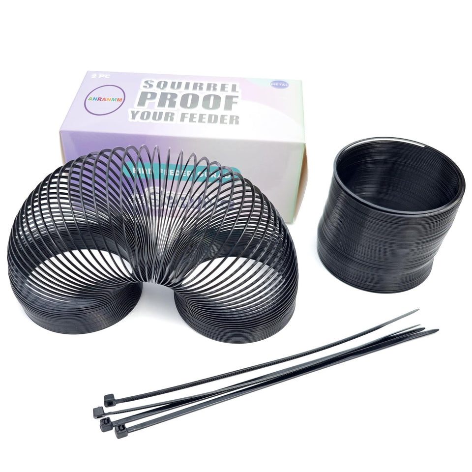 Anranmm Squirrel Proof Spring Device on a pole protects your bird feeder from intruders