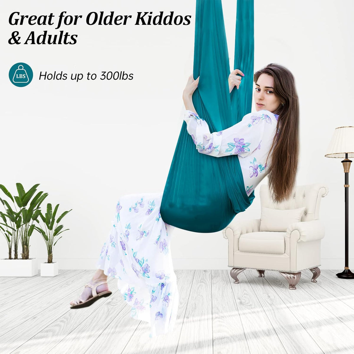 Child enjoying the cocoon in the Aokitec therapy swing for calming movement.