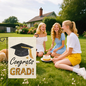 AONSOULE diploma-cap design detail adds celebratory flair to outdoor display.