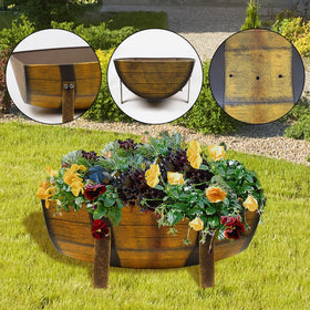 Aoutrow rustic brown barrel planter adds warm outdoor decor.