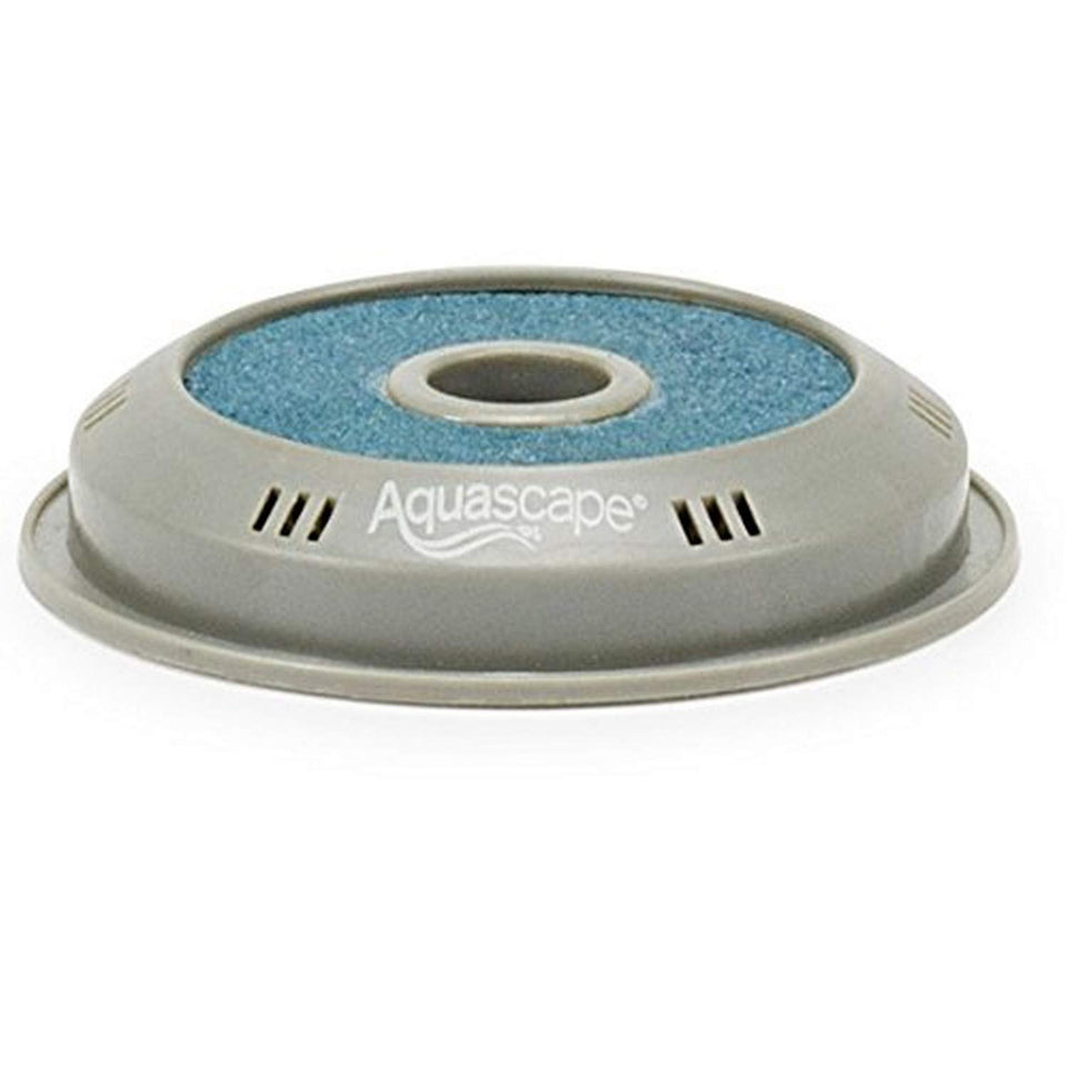 Aquascape pond aeration disc resting on the pond floor to boost circulation and water quality.