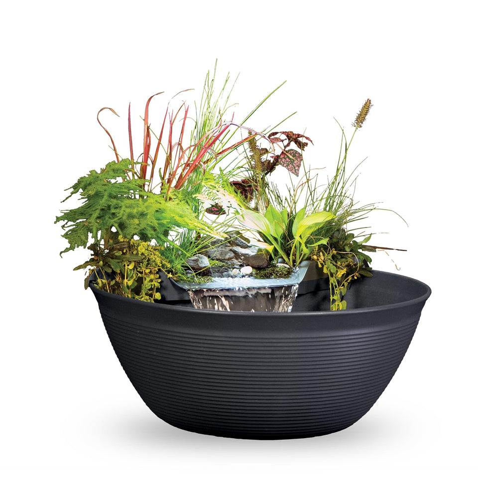 Aquascape Pond and Waterfall Kit full setup creates a calming outdoor focal point.