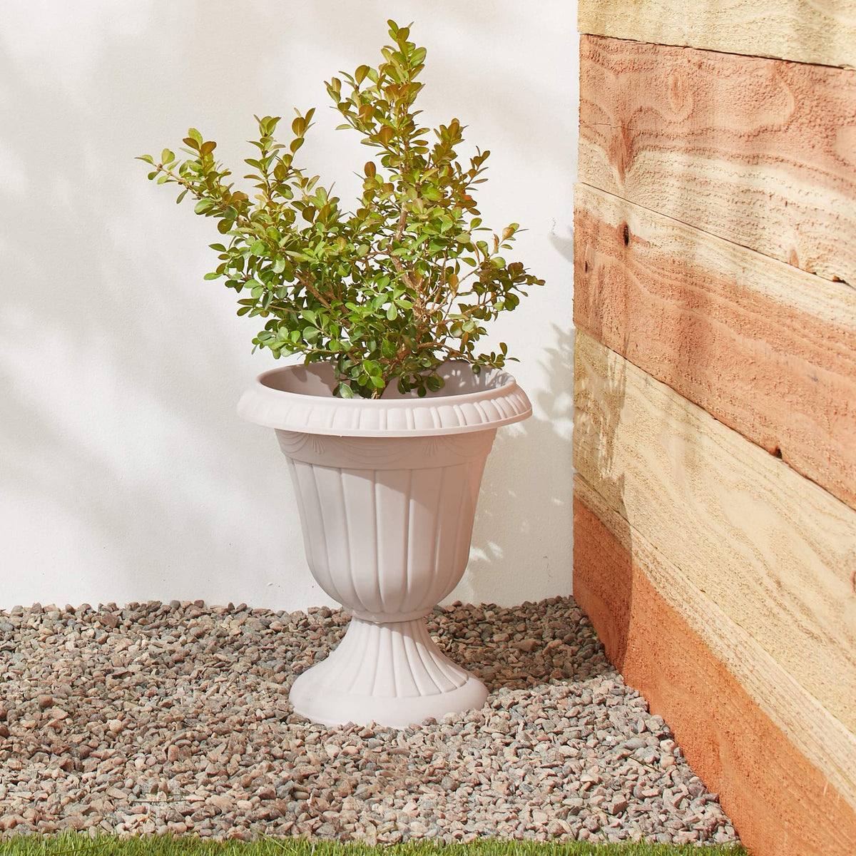 Arcadia urn opening diameter 11 inches supports easy planting and flexible arrangements.