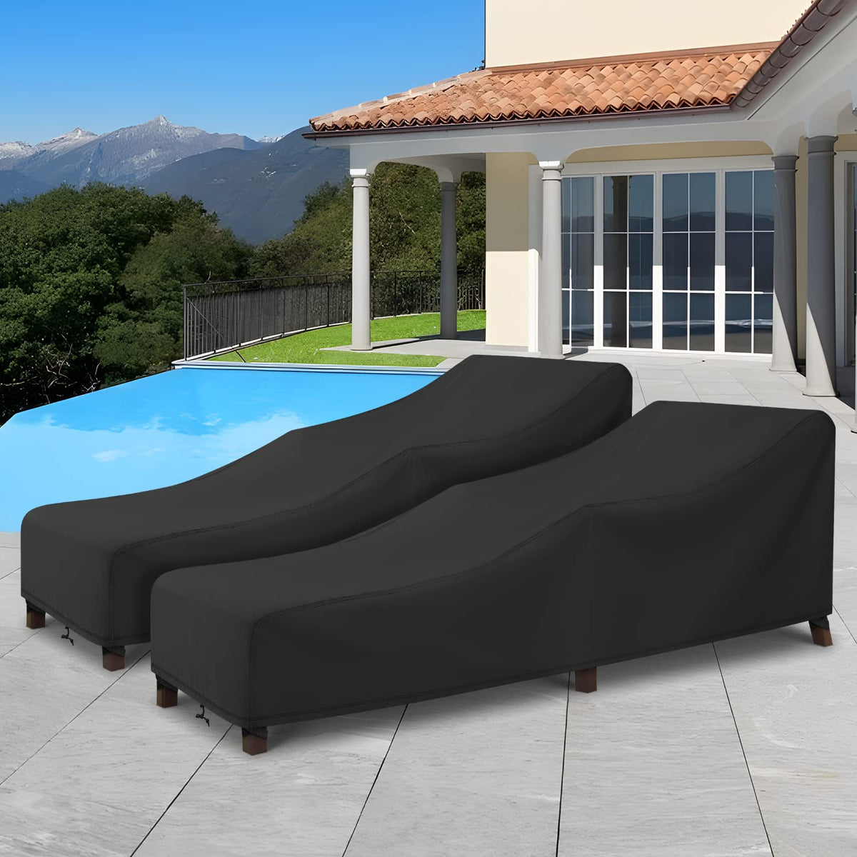 Arcedo outdoor setup showing black covers on lounge furniture.