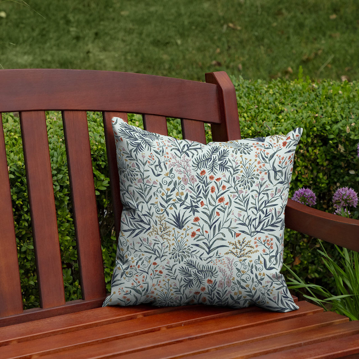 Arden Selections outdoor toss pillow side view on a chair features 16x16 size